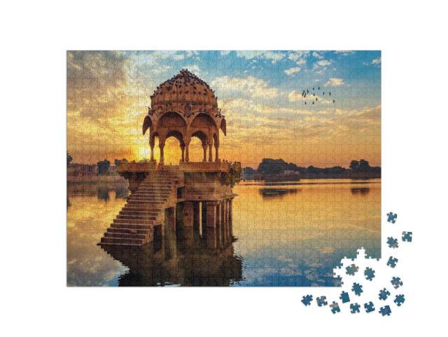 Puzzle 1000 pezzi „Tramonto davanti alle rovine di Gadi Sagar, India“