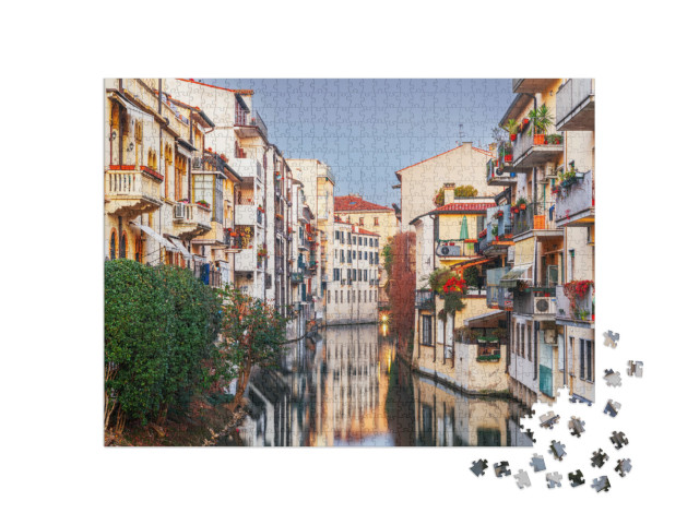 Puzzle 1000 pezzi „Padova, Italia, canali ed edifici al tramonto.“
