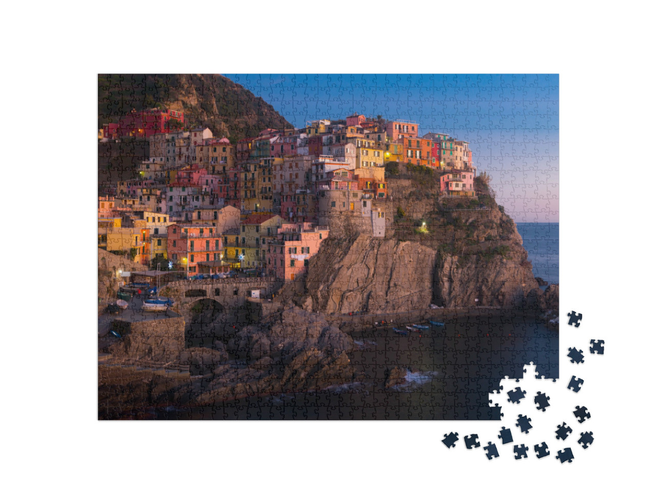 Puzzle 1000 pezzi „Manarola colorata sulla costa al tramonto in Italia all'aperto.“