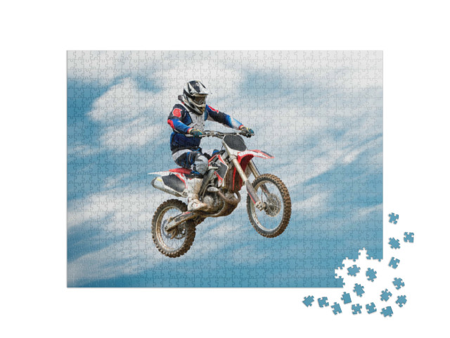 Puzzle 1000 pezzi „Motociclisti che eseguono un'acrobazia in aria“