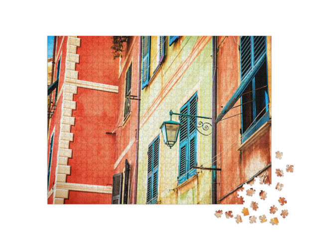 Puzzle 1000 pezzi „Bella facciata colorata di una casa italiana, Portofino, Genova, piccolo villaggio di pescatori“