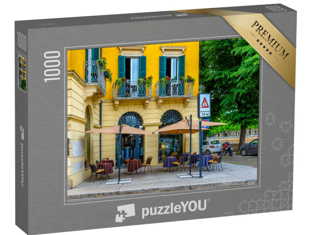 Puzzle 1000 pezzi „Vecchia strada con tavoli di un ristorante a Verona, Italia. Architettura e monumenti di Verona“