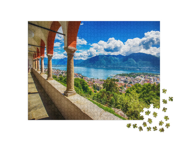 Puzzle 1000 pezzi „Locarno e il Lago Maggiore nelle Alpi svizzere“