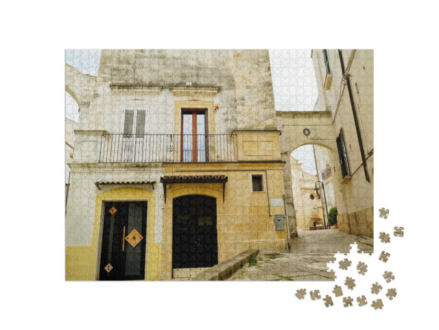Puzzle 1000 pezzi „i vicoli e la gravina del centro storico di Gravina di Puglia. Puglia. Italia“