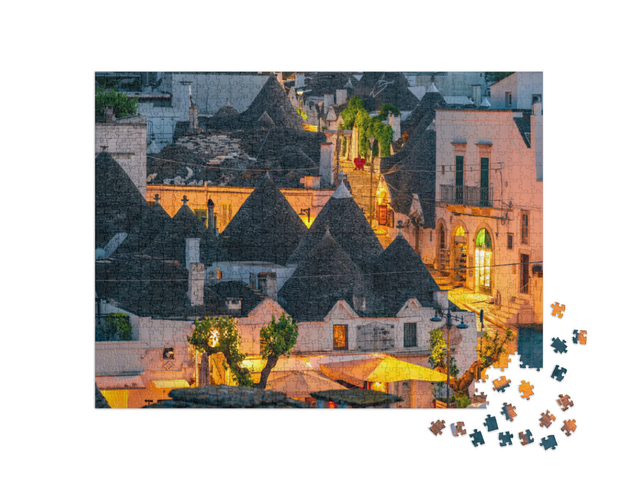 Puzzle 1000 pezzi „Trulli di Alberobello, Puglia, Italia. città di Alberobello con case a trulli tra piante verdi e fiori“