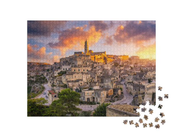 Puzzle 1000 pezzi „Vista del borgo di Matera su uno sperone roccioso in una bella giornata autunnale, Basilicata“