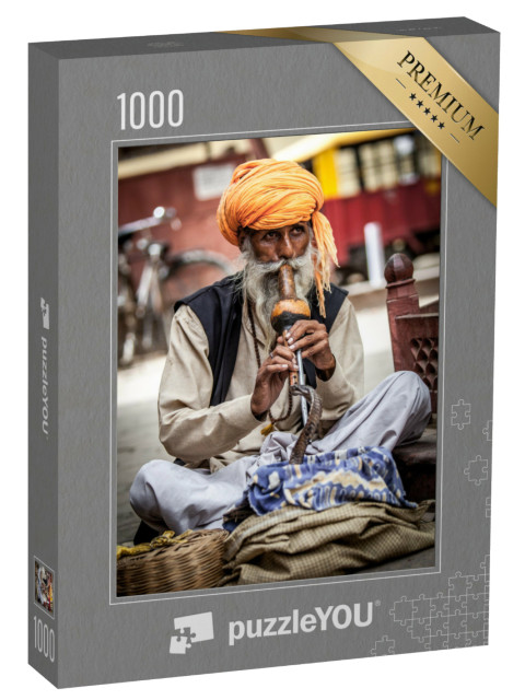 Puzzle 1000 pezzi „Incantatore di serpenti su una strada in India“