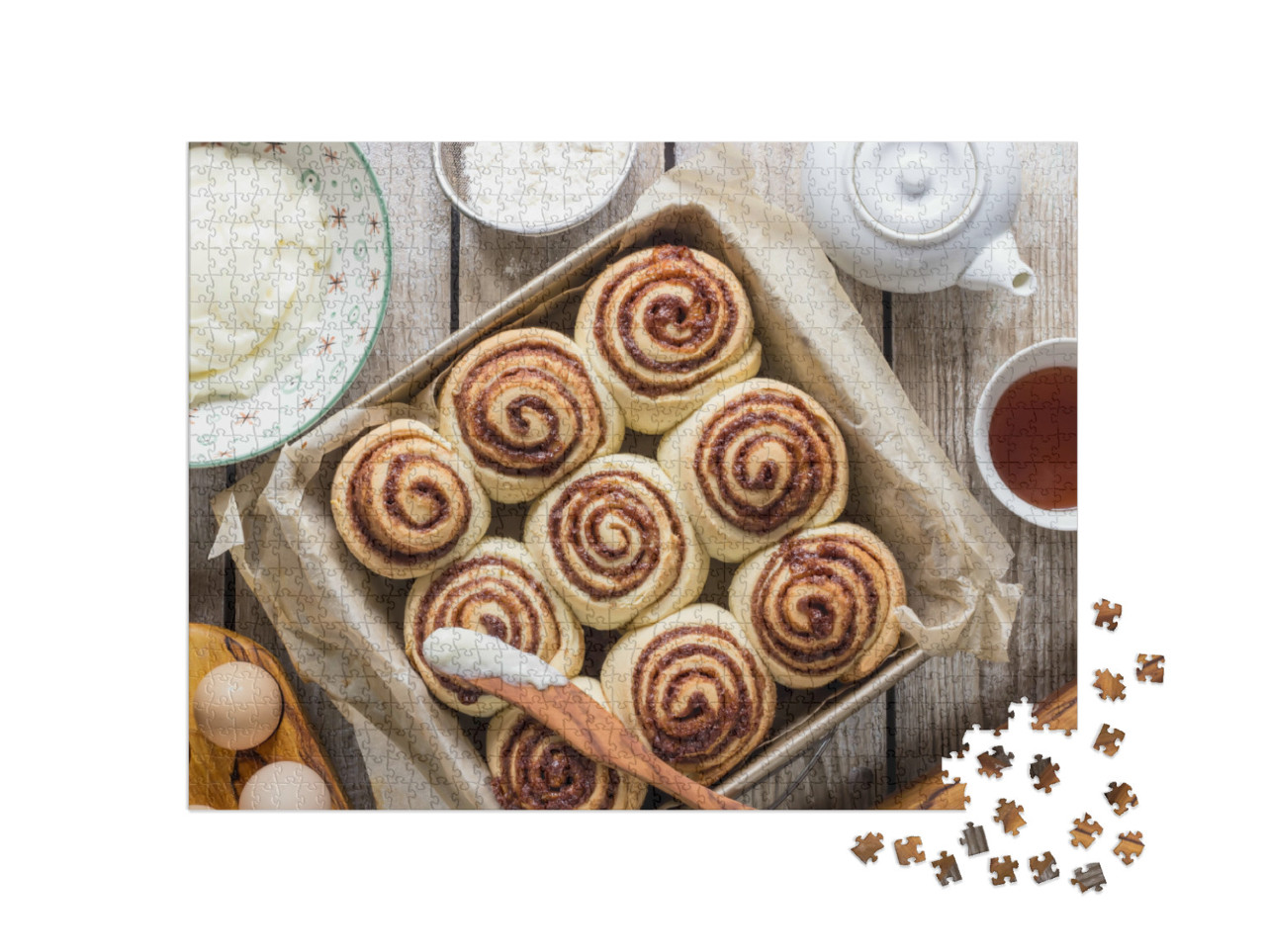 Puzzle 1000 pezzi „Panini alla cannella con ripieno di spezie e cacao su carta da forno“