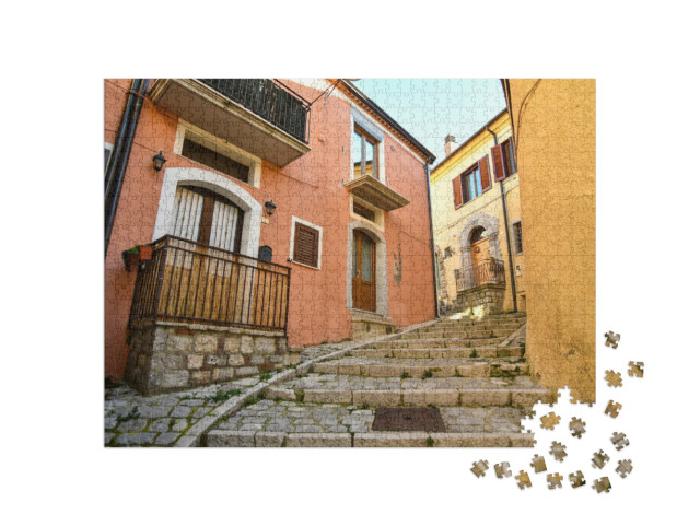 Puzzle 1000 pezzi „Una stradina tra le antiche case di Pignola, borgo medievale della Basilicata“