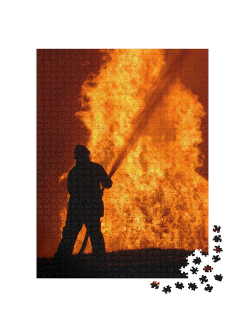 Puzzle 1000 pezzi „Vigile del fuoco solitario in lotta contro l'incendio“