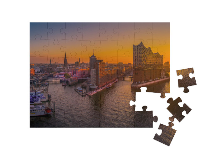 Puzzle 48 pezzi „L'alba su Amburgo con la sala concerti Elbphilharmonie“