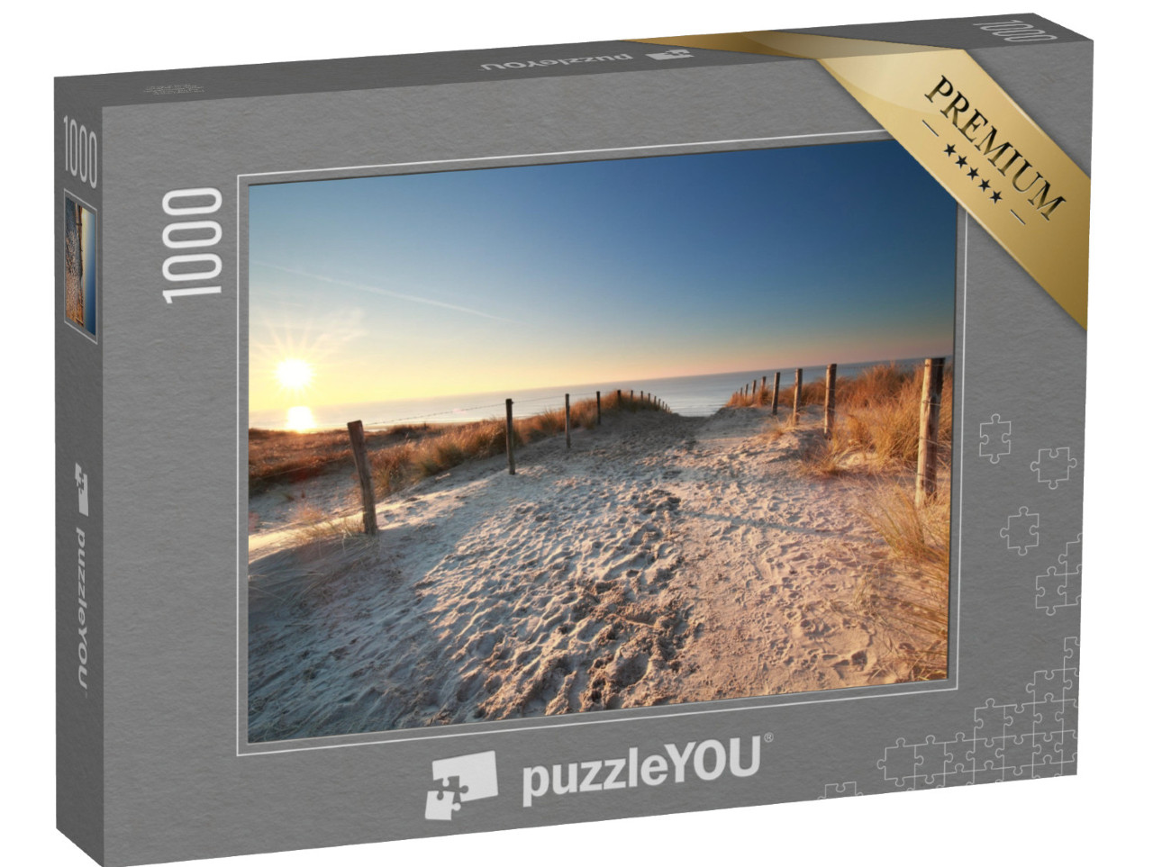 Puzzle 1000 pezzi „La luce del sole su un sentiero sabbioso verso la spiaggia del Mare del Nord, Olanda“