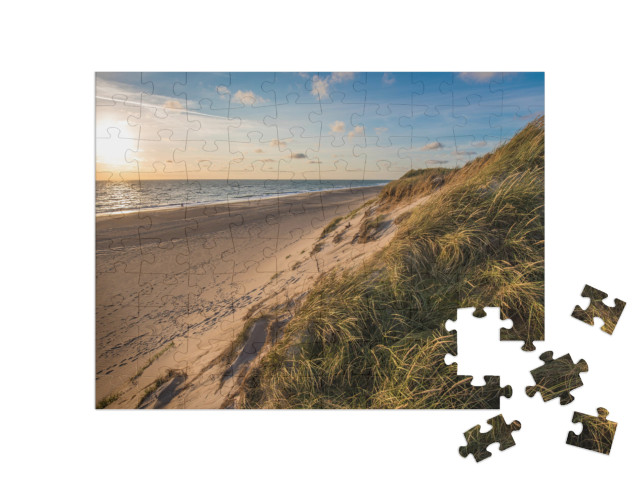 Puzzle 100 pezzi „Spiaggia del Mare del Nord, costa dello Jutland, Danimarca“