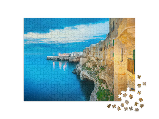 Puzzle 1000 pezzi „Polignano a Mare, villaggio sulle rocce al tramonto, Bari, Puglia, Italia meridionale. Europa.“
