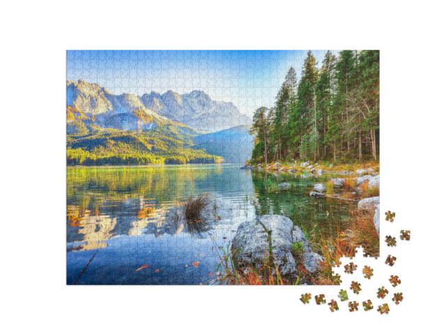 Puzzle 1000 pezzi „Il lago Eibsee di fronte alla vetta della Zugspitze nella lista autunnale, Baviera, Germania“