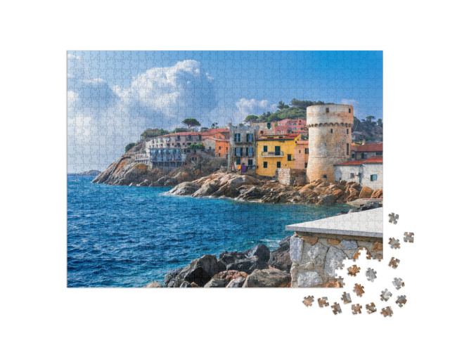 Puzzle 1000 pezzi „Il piccolo villaggio costiero di Giglio Portoâ, con case colorate, Toscana“