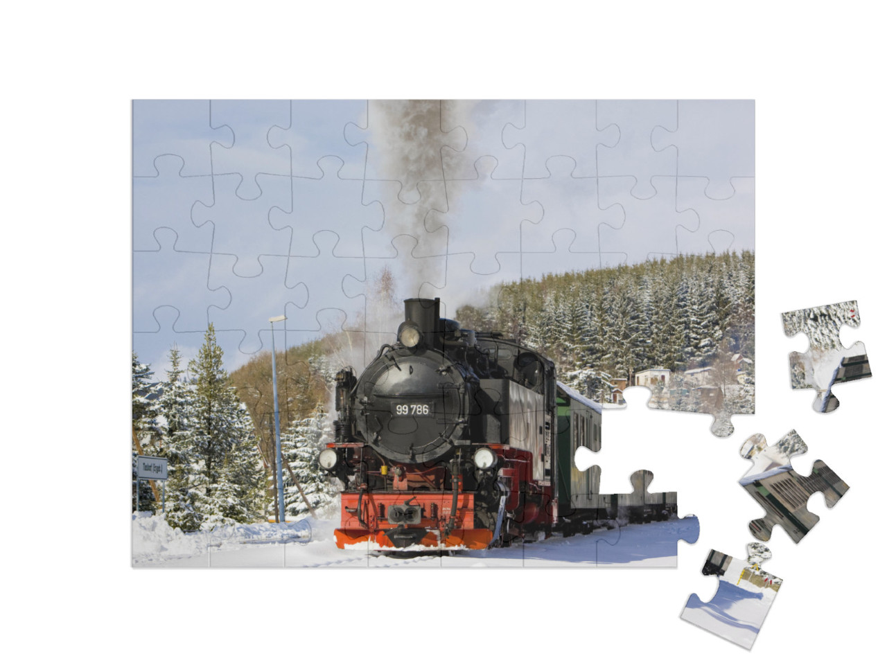 Puzzle 48 pezzi „Treno a vapore della ferrovia del Fichtelberg presso Oberwiesenthal, Germania“