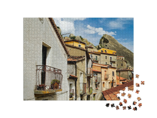 Puzzle 1000 pezzi „Castelmezzano, l'antico borgo immerso nei tipici panorami delle Dolomiti Lucane, Potenza, Italia“