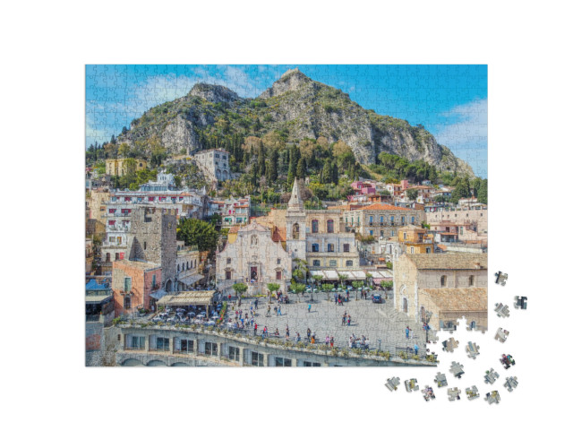 Puzzle 1000 pezzi „Viste aeree, Belvedere di Taormina e Chiesa di San Giuseppe in Piazza IX Aprile“