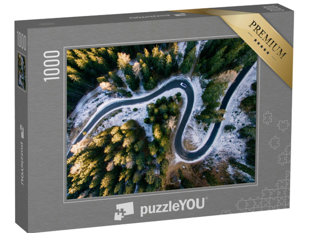 Puzzle 1000 pezzi „Strada tortuosa e innevata nelle Dolomiti“