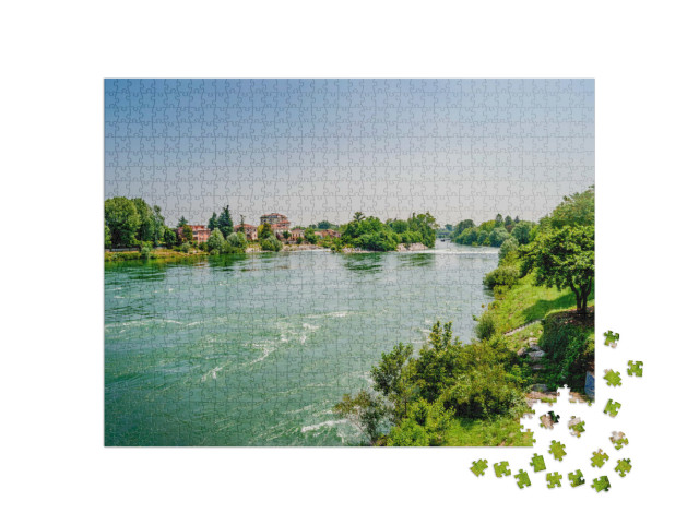 Puzzle 1000 pezzi „Vista del fiume Adda dal ponte Napoleone-Bonaparte a Lodi, in Lombardia“