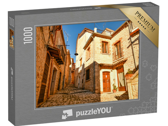 Puzzle 1000 pezzi „Una strada tra le caratteristiche case di Buonalbergo, un paese di montagna in provincia di Benevento“