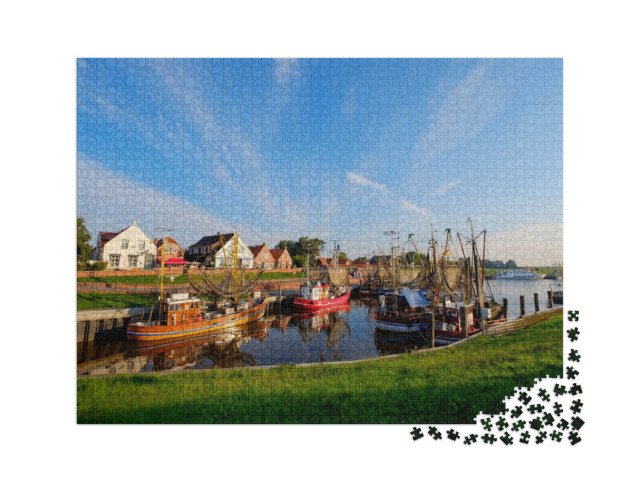 Puzzle 2000 pezzi „Il porto di pesca di Greetsiel, Germania“