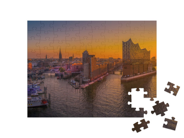 Puzzle 100 pezzi „L'alba su Amburgo con la sala concerti Elbphilharmonie“