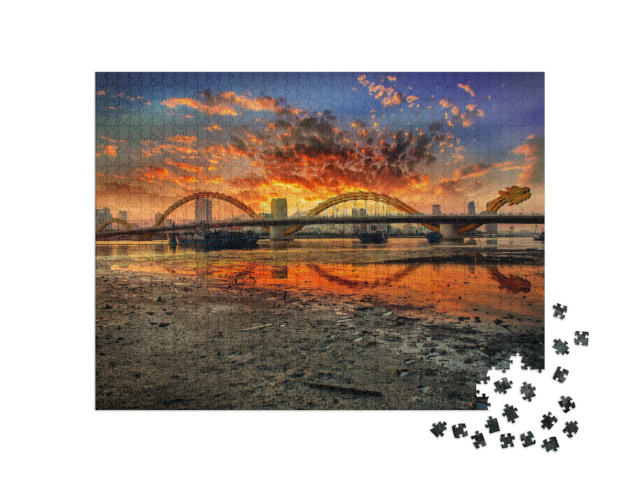 Puzzle 1000 pezzi „Il ponte del drago al tramonto: foto da Da Nang, Vietnam“