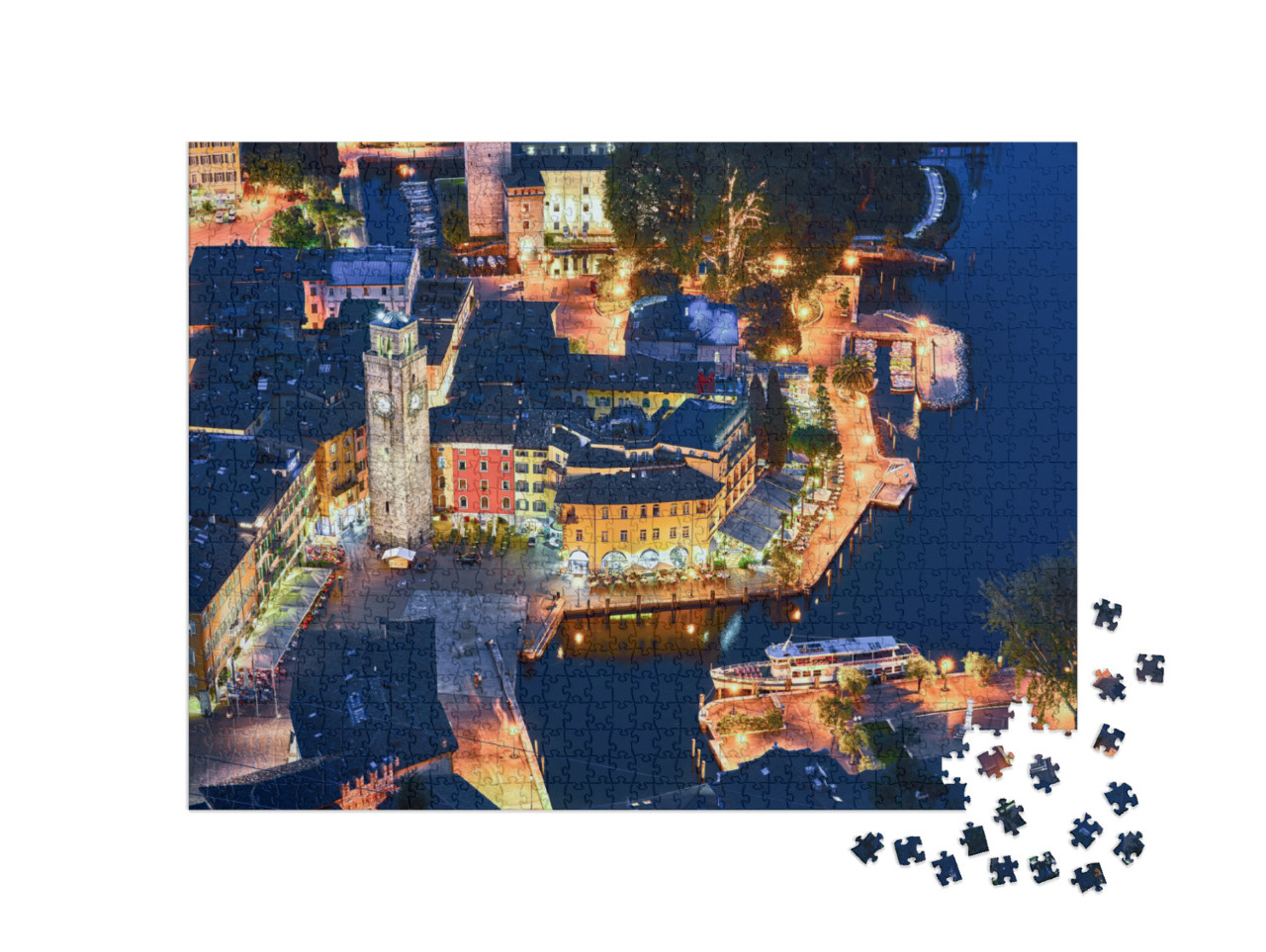 Puzzle 1000 pezzi „Vista del bellissimo lago di Garda .Riva del Garda città e lago di Garda di notte, Italia“