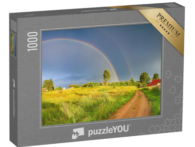 Puzzle 1000 pezzi „Arcobaleno su nuvole scure di pioggia in un paesaggio rurale“