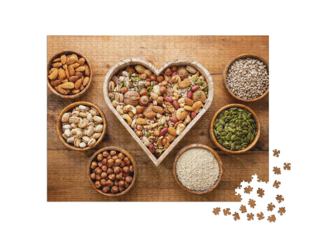 Puzzle 1000 pezzi „Scatola a forma di cuore con mix di noci“