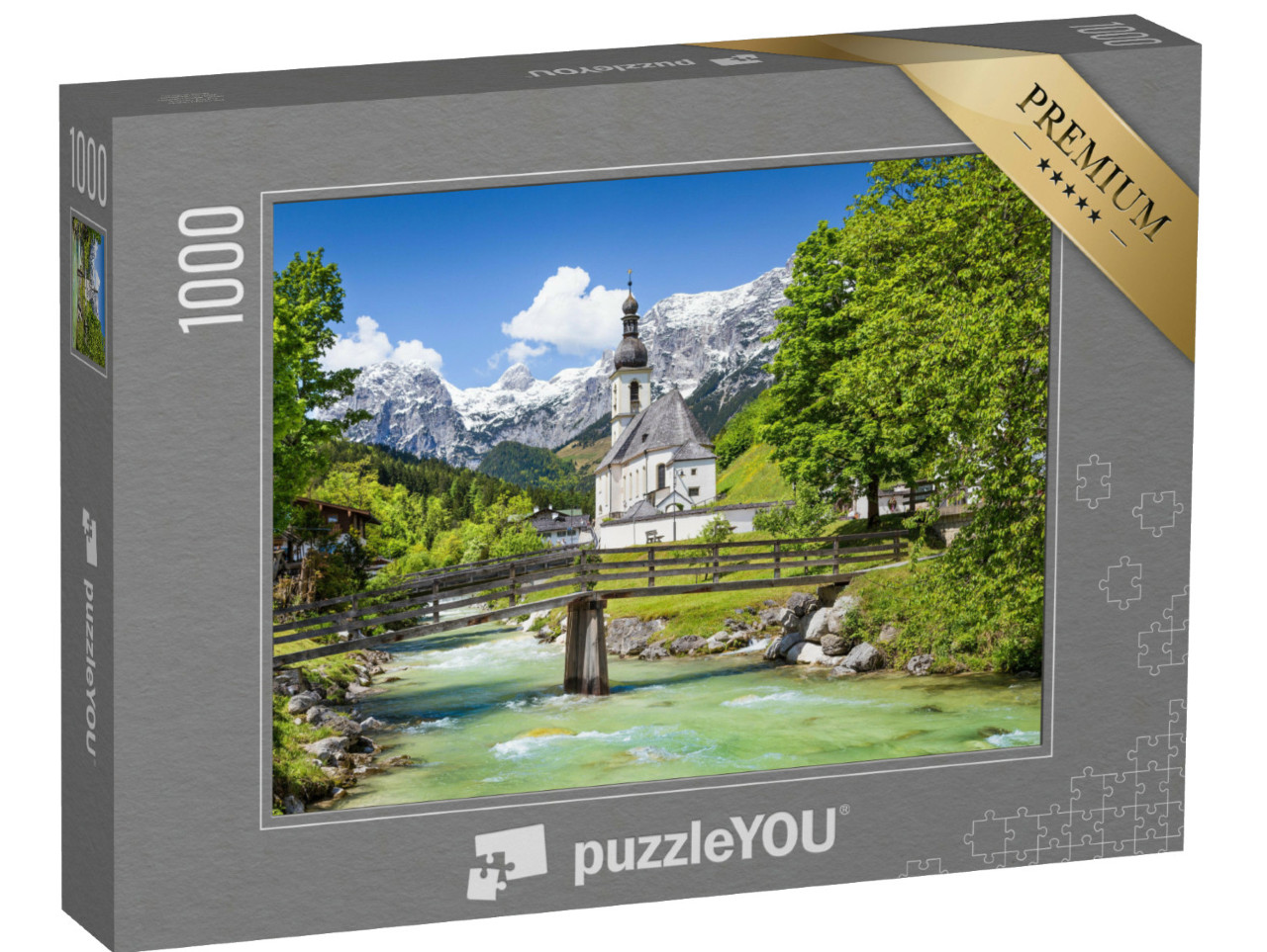 Puzzle 1000 pezzi „Pittoresco paesaggio montano con la chiesa parrocchiale di San Sebastiano nel villaggio di Ramsau“