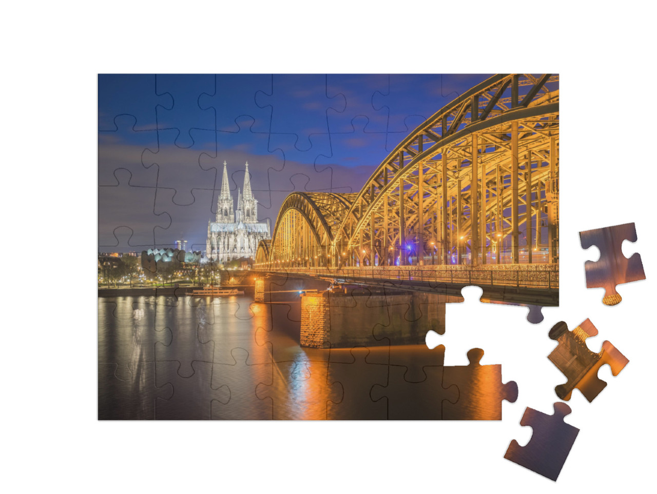 Puzzle 48 pezzi „Vista notturna della Cattedrale di Colonia a Colonia, Germania“