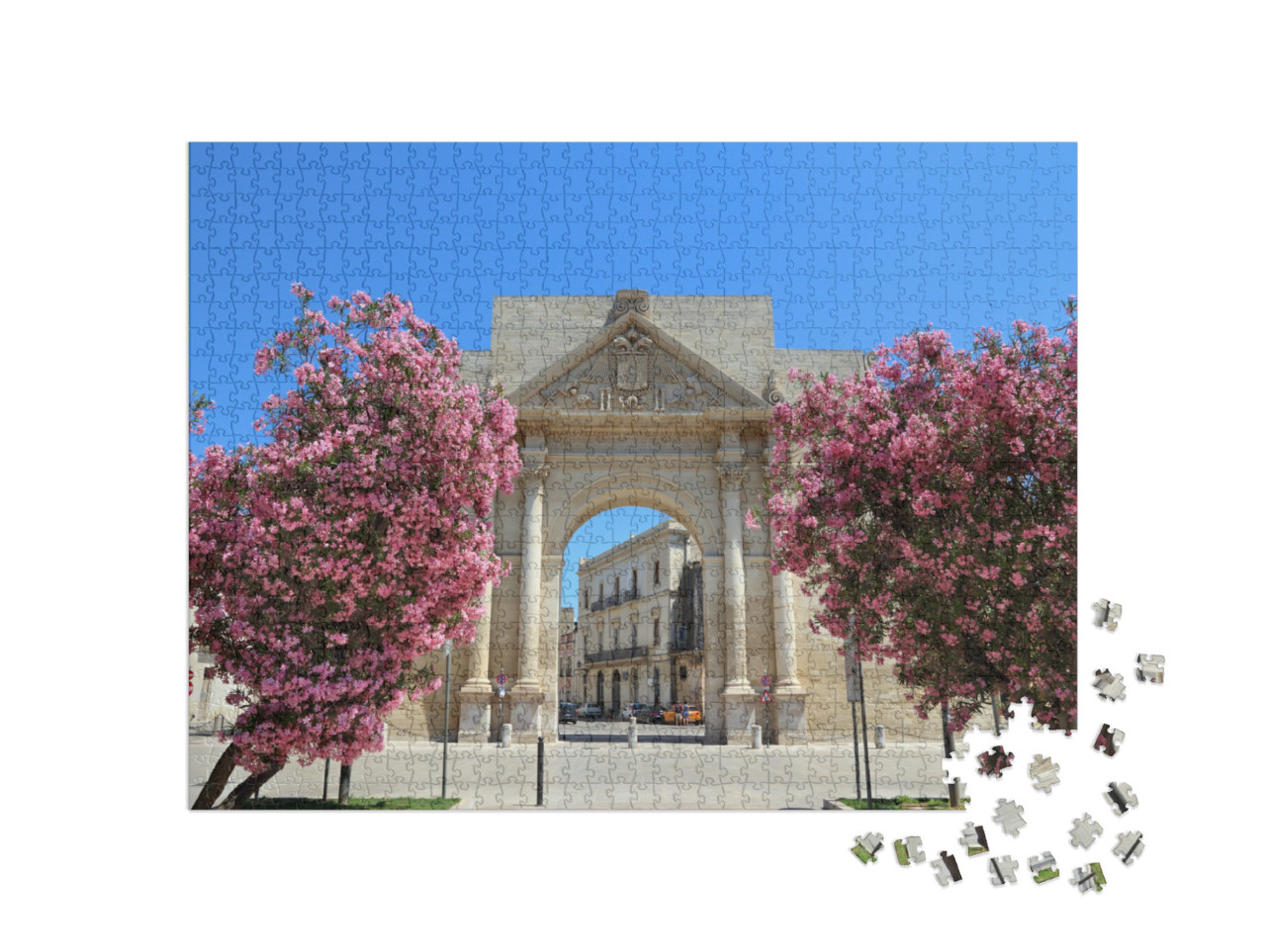 Puzzle 1000 pezzi „Lecce, Italia - città della penisola salentina. Arco di trionfo di Porta Napoli con fiori di oleandro.“