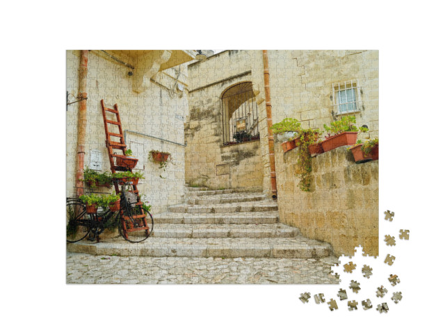 Puzzle 1000 pezzi „L'incredibile complesso rupestre di Matera con i due rioni storici del Sasso Barisano e del Sasso Caveoso“