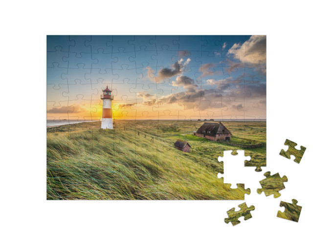 Puzzle 100 pezzi „Alba al faro di List on Sylt, Schleswig-Holstein, Germania“