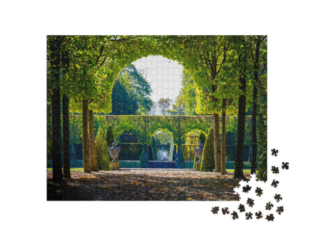 Puzzle 1000 pezzi „Alberi verdi nei giardini del palazzo di Schwetzingen, Baden Württemberg“