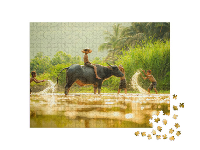 Puzzle 1000 pezzi „Giochi d'acqua - ragazzi e bufali d'acqua in Asia“
