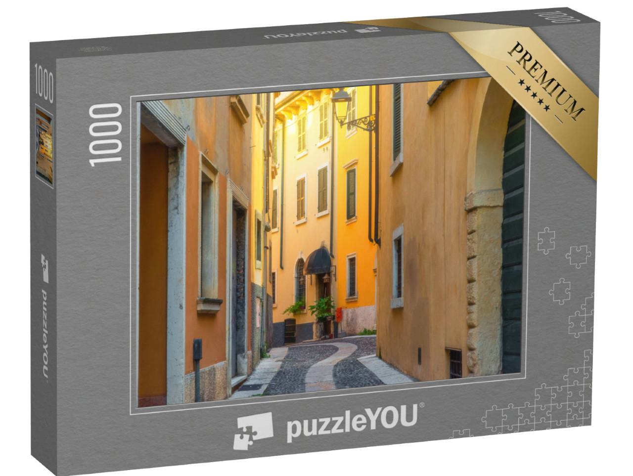 Puzzle 1000 pezzi „Strada medievale stretta e acciottolata con edifici gialli nella città di Verona, Veneto, Italia“