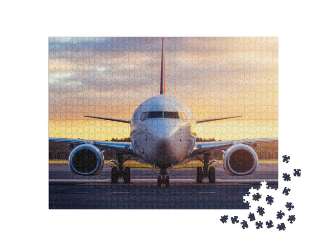 Puzzle 1000 pezzi „Aeroplano pronto a decollare verso il tramonto“