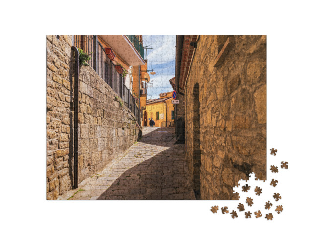 Puzzle 1000 pezzi „Castelmezzano: vedute del centro storico e del paesaggio che circonda il paese, Italia“