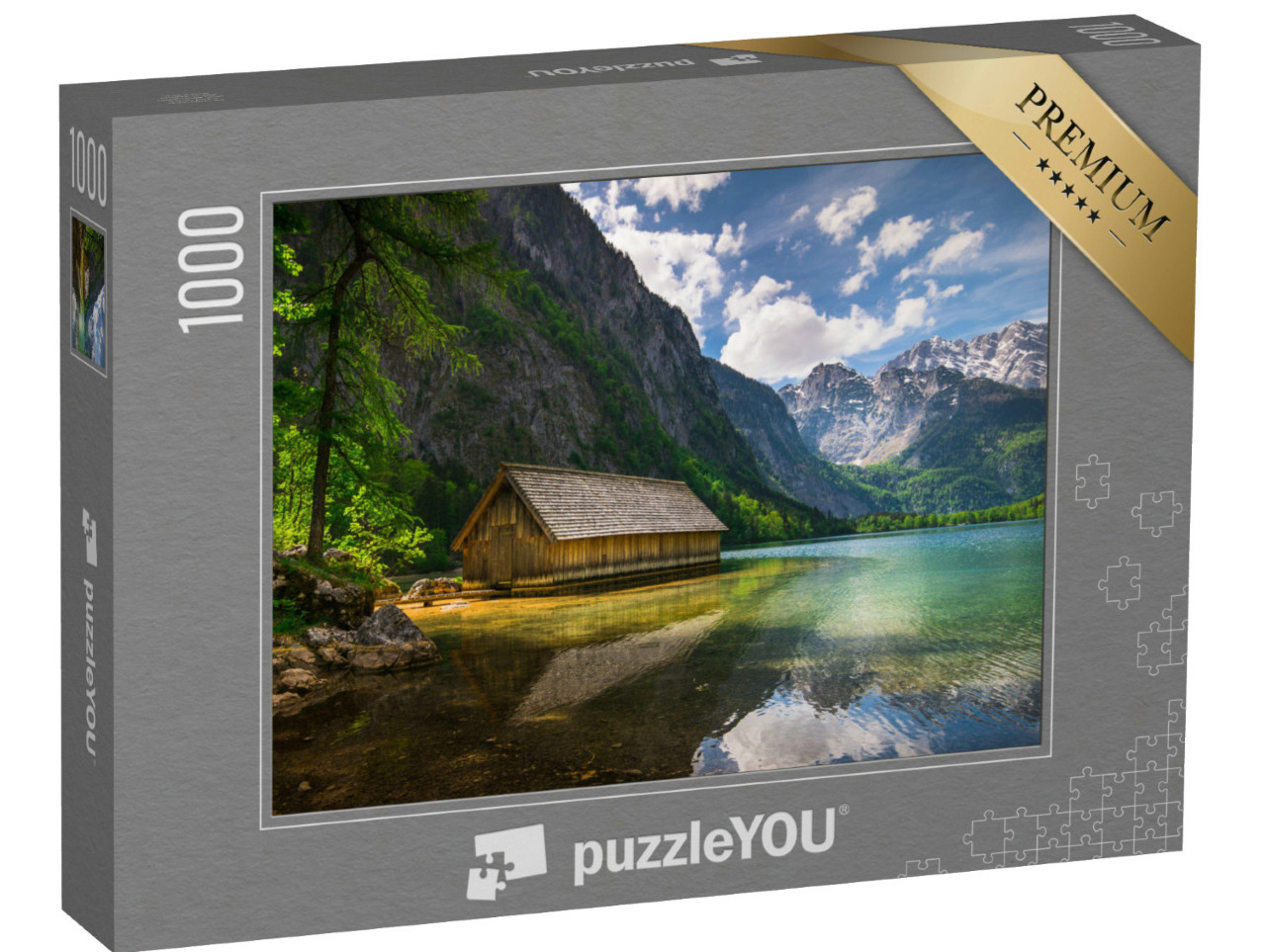 Puzzle 1000 pezzi „Una solitaria capanna di legno in riva a un lago di montagna“