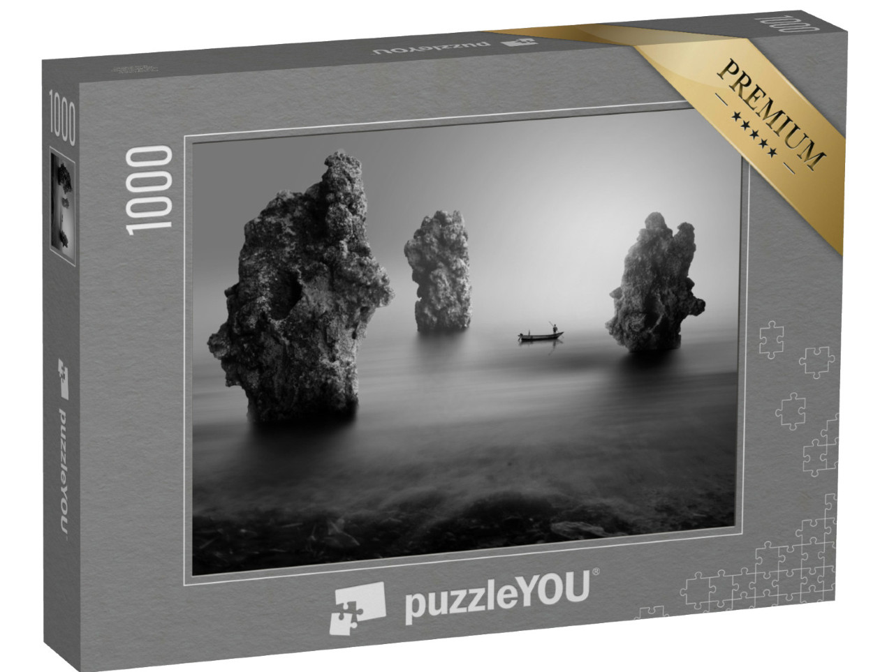 Puzzle 1000 pezzi „Pescatore solitario tra le rocce del mare“
