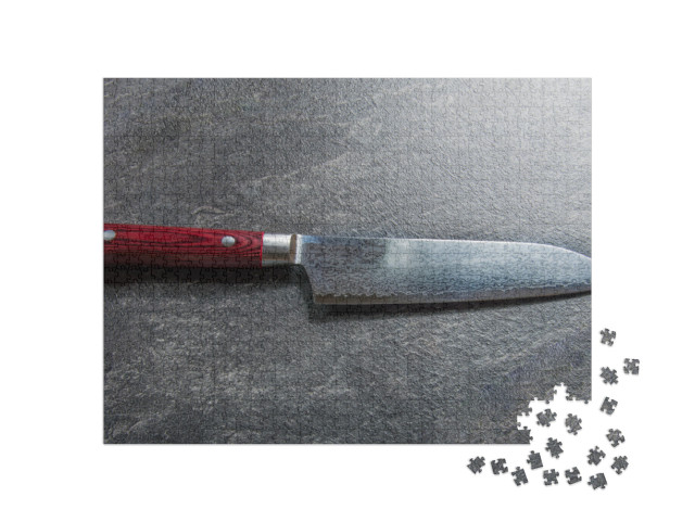 Puzzle 1000 pezzi „Coltello da chef giapponese in acciaio Damasco“