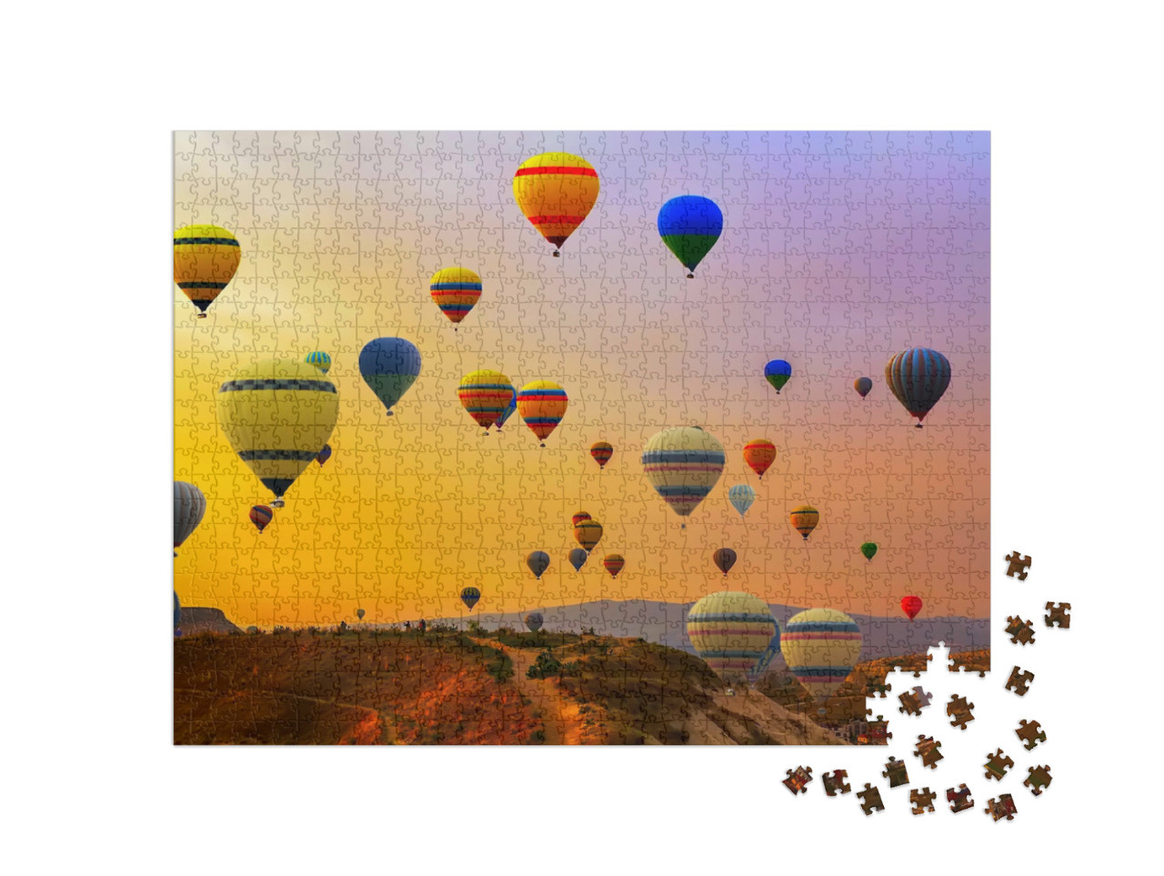 Puzzle 1000 pezzi „Mongolfiere in atterraggio su una montagna, Cappadocia, Turchia“