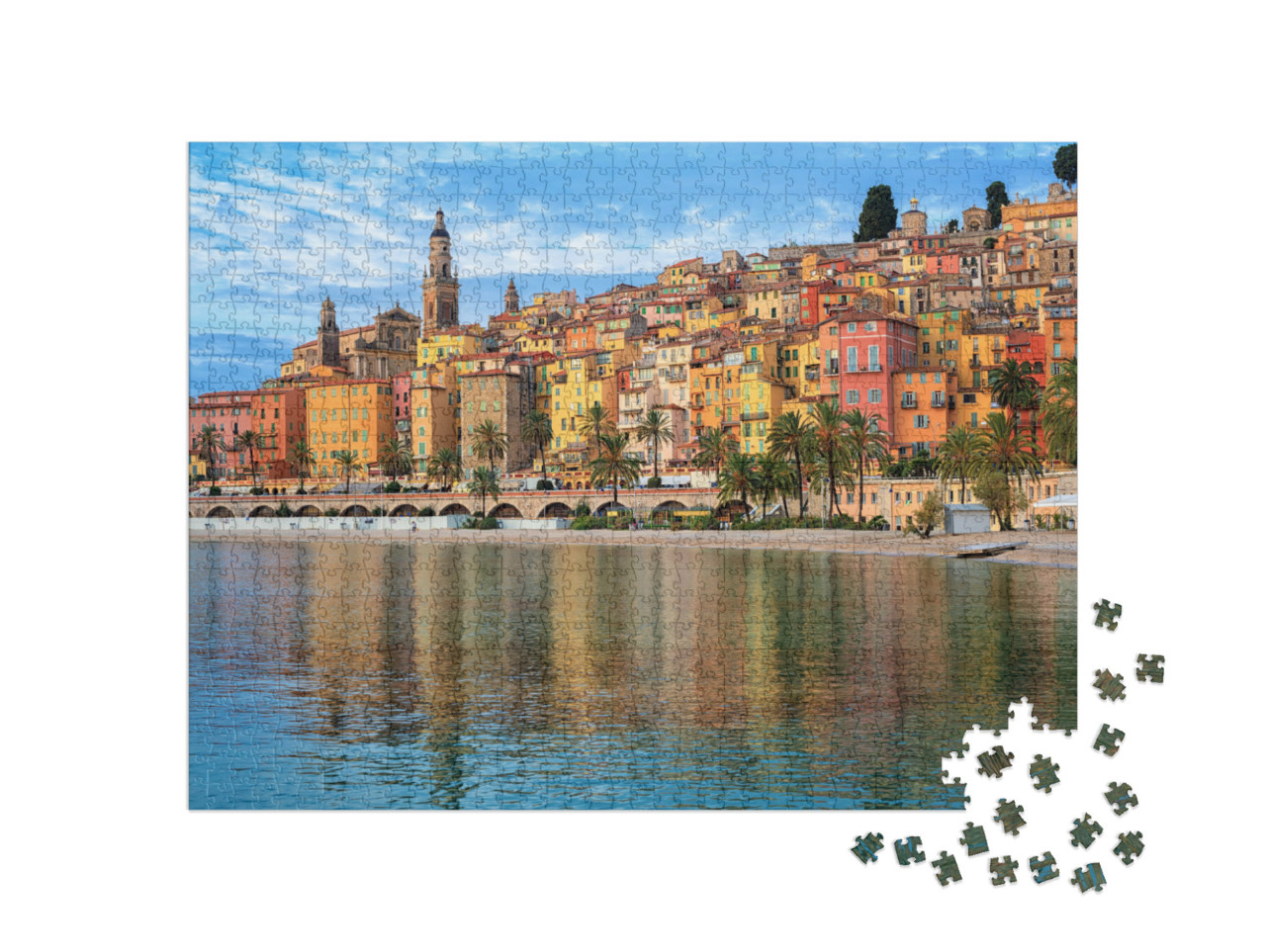 Puzzle 1000 pezzi „Case colorate e spiaggia sabbiosa: vista di Mentone, Riviera, Francia“